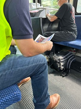 person on the bus taking the survey